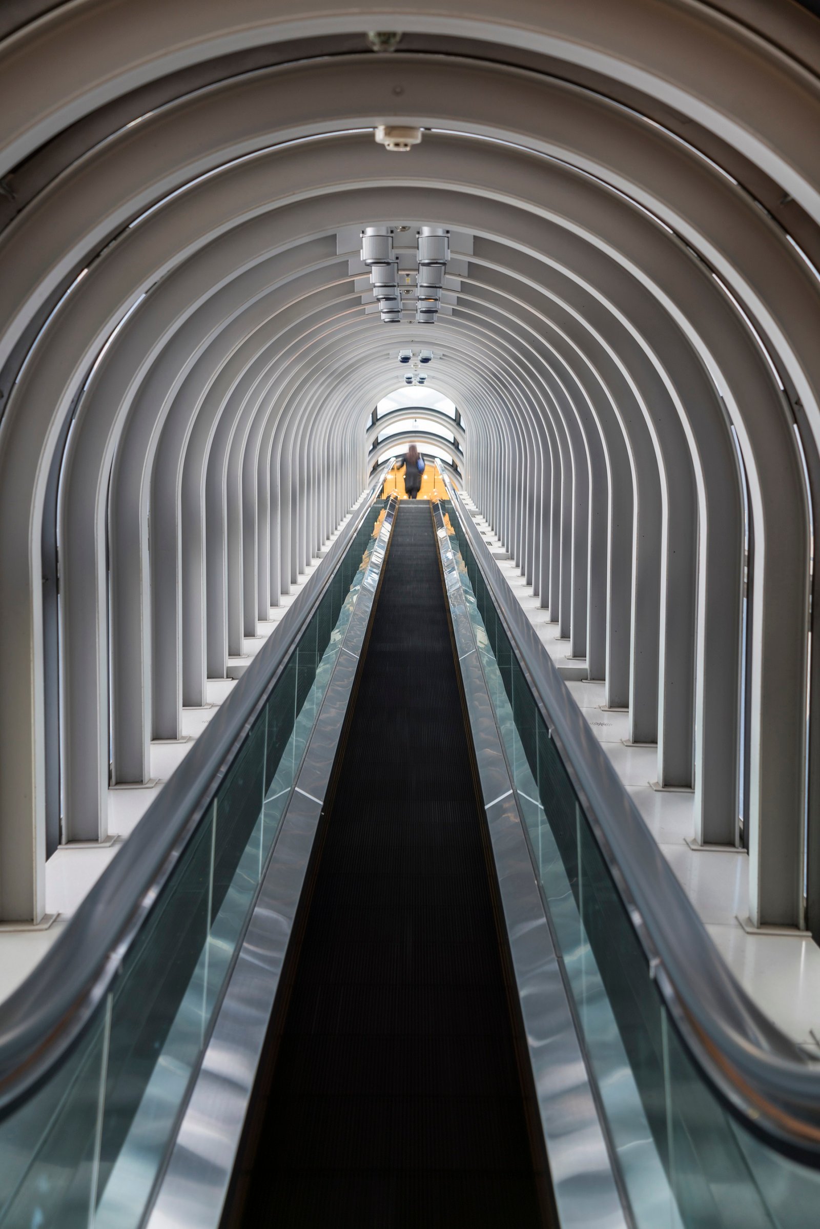 Osaka,Japan,Interior view of contemporary building with escalator Interior view of contemporary building with escalator